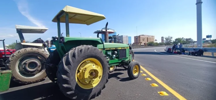Maiceros de Jalisco rechazan pago de mil pesos por tonelada y advierten que seguirán los bloqueos Maiceros de Jalisco rechazan pago de mil pesos por tonelada y advierten que seguirán los bloqueos